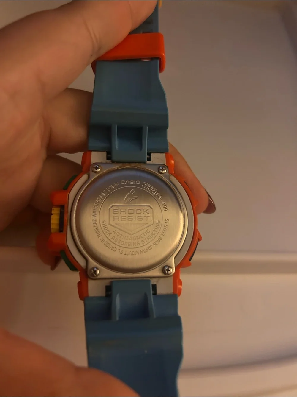G-Shock Orange and Blue Sport Watch with Yellow Accents